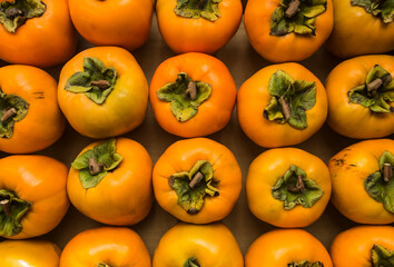 Persimmon fruits in full screen. 