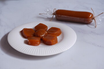traditional dessert made from glutinous rice cake and palm sugar named dodol jenang in white background