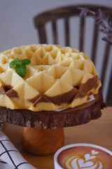whole cake in a wooden tier 