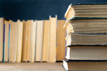 Book background. Old books in the library. Bookshelf shop. Knowledge, publications, literature. Bookish, bookstore, bookshop