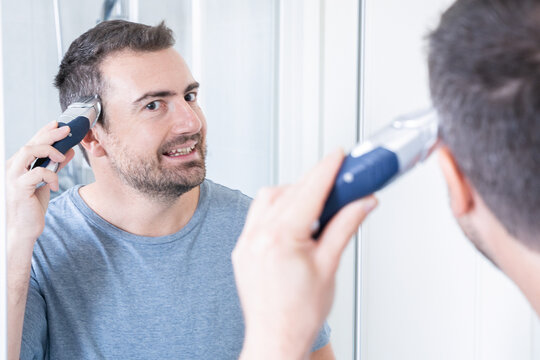 Man Self Cutting His Hair At Home Alone Using Electric Hair Cutter