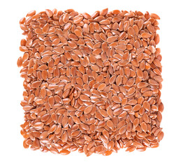 Brown flax seeds isolated on white background. Heap of dry flaxseed or linseed. Top view.
