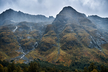 Rising mountains near Bjørke, the innermost part of the Hjørundfjorden, Norway