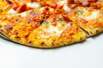 Delicious Neapolitan pizza based on buffalo mozzarella and tomatoes, italian cuisine