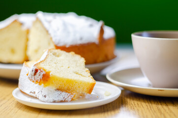 Portion of Madeira ring loaf cake served on a small plate