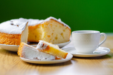 Portion of Madeira ring loaf cake served on a small plate