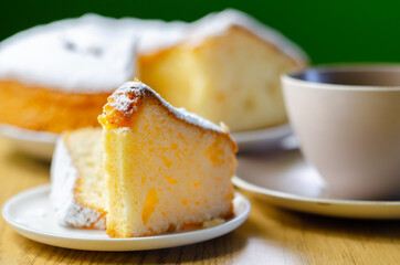 Portion of Madeira ring loaf cake served on a small plate