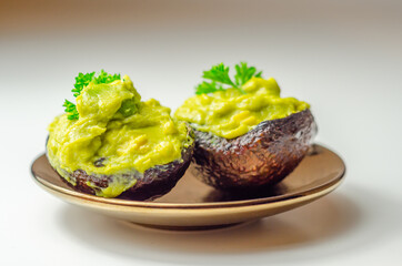 Smashed avocado,  smother avocado with lemon juice served on the for brunch