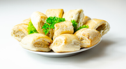 Cocktails sausage rolls, seasoned pork sausage meat wrapped in puff pastry