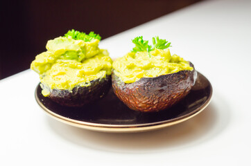Smashed avocado,  smother avocado with lemon juice served on the for brunch