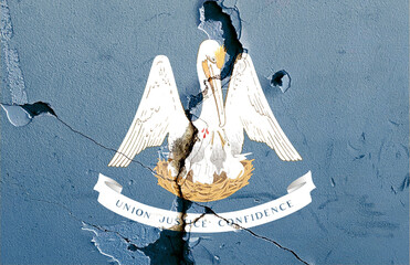 National flag of Louisiana U.S state on a cracked blue wall