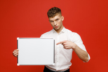 Young businessman is showing the word. Your text here