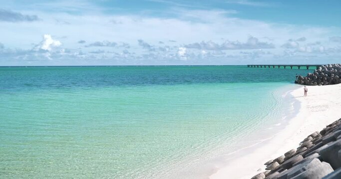 Clear turquoise ocean and white sandy beach in Miyako Island Okinawa Japan tropical summer background