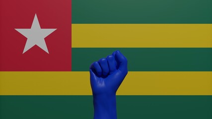 A single raised blue fist in the center in front of the national flag of Togo