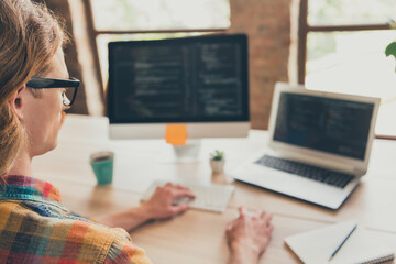 Profile side photo of young man computer type script code programmer jawa data system worker indoors