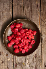 Ripe raspberries in a bowl