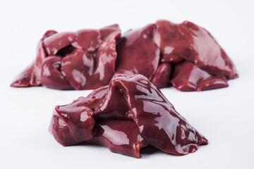 Obraz premium Raw chicken liver close up isolated on white background with copy space