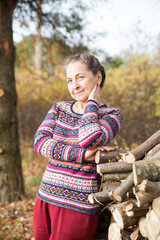 Portrait of   elderly Russian woman in   sweater in   village