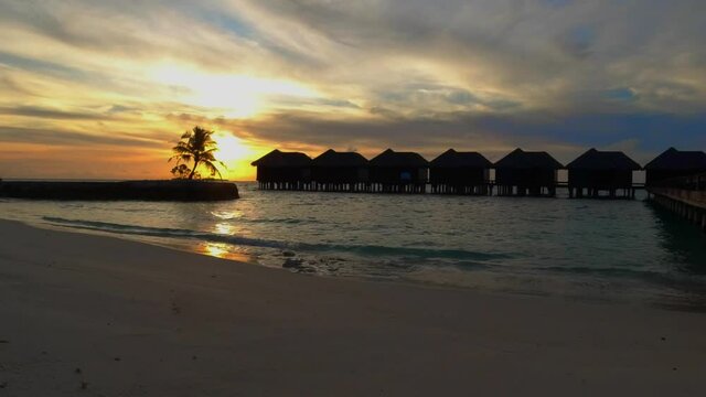 Sunset Time-Lapse Shooting at the Maldives Island. Overwater bunglow. Fast Time.