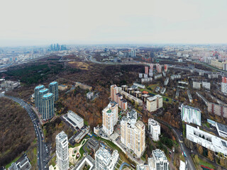 Obraz premium urban landscape with playgrounds in a residential complex on an autumn day filmed from a drone 