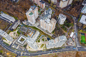 Fototapeta premium urban landscape with playgrounds in a residential complex on an autumn day filmed from a drone 