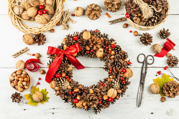 Autumn wreath of cones, nuts, and berries. Assortment from natural materials