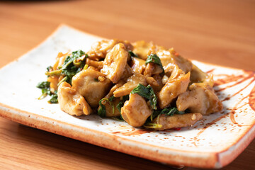 Stir-fried fish balls with basil, handmade in traditional Thai style