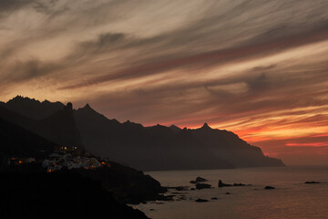 Fototapeta premium Between the Roques de Benijo and La Rapadura is one of the most beautiful virgin beaches in the north of the island: Benijo Beach. The black sand of this small beach in Tenerife and the landscape..