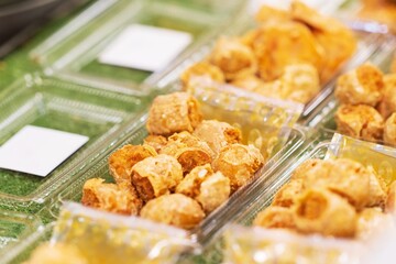 Closeup of Deep Fried Crab Meat Rolls, thai street food market