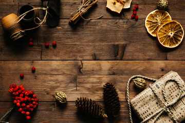 Festive background for recording, top view. On a wooden table. Autumn-winter. Festive mood. A mug of coffee.