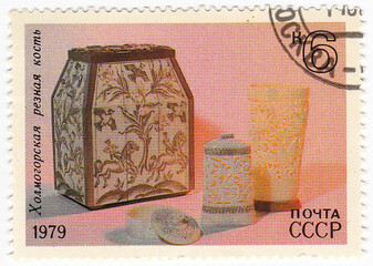 stamp with flowers on the box 1979 year. stamp printed in the country shows the country circa