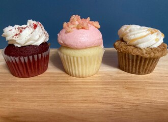 mini gourmet cupcakes with frosting