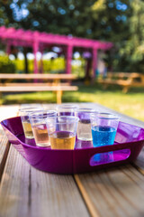 Flight of craft ciders on a beautiful outdoor patio. Small Talk Vineyards, Niagara Canada