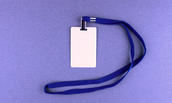Blank White Badge With Blue Drawstring On Blue Background. Pass To Work, Conference