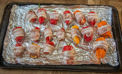 Colorful mini peppers wrapped with bacon