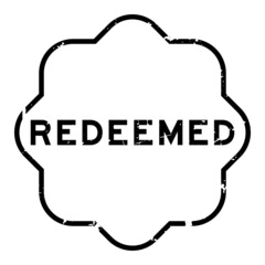 Grunge black redeemed word rubber seal stamp on white background