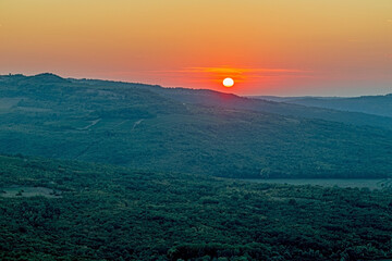 Picture of a sunrise taken from the city wall of the historical, Croatian city Motovun