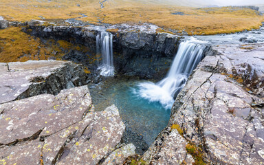 High angle view of the Skutafoss double waterfall, south-east Iceland. Long exposure landscape in autumn.