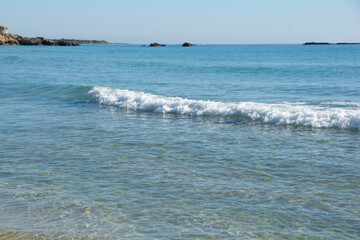 Fototapeta na wymiar Beautiful Sicilian beach and sea, blue sky and crystal clear sea.