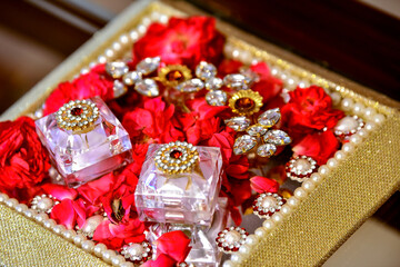 Fototapeta na wymiar Golden rings, wedding rings of the bride and groom for indian wedding rituals