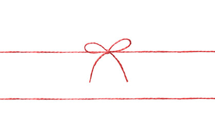 String twine rope red color with bow isolated on white.Thread,fiber.