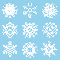 Naklejka na ściany i meble Winter set of white snowflakes isolated on light blue background. Snowflake icons. Snowflakes collection for design Christmas and New Year banner and cards.