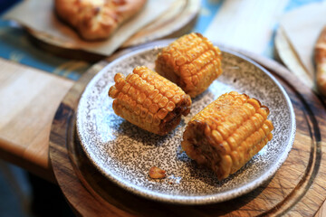Grilled corn on plate