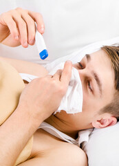 Sick Young Man in the Bed