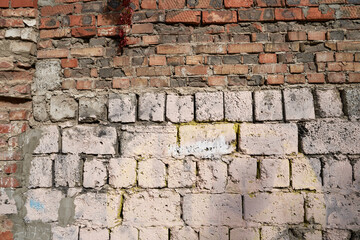 Old brick wall, old texture of stone blocks closeup