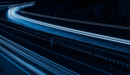 blue car lights at night. long exposure