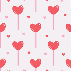 Fototapeta na wymiar Vector seamless pattern with heartshaped lollipops. Design with candies and hearts.