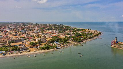 Banjul, Gambia,is the sea port where the ferry from malabo brings you to Banjul. You can also take a small speed boat across the river to Banjul. When the big ships arrive the port  - obrazy, fototapety, plakaty