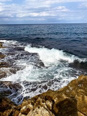 Ocean waves crashing on rocks