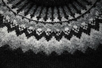 Traditional Icelandic wool sweater, called a lopapeysa. Close up of the knitted texture and...